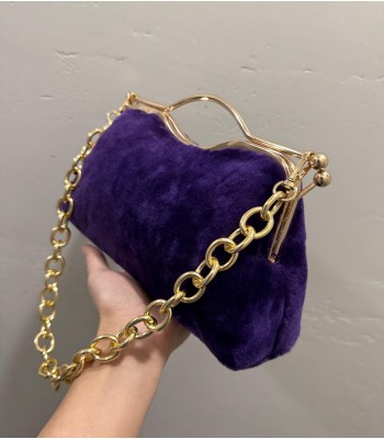 Purple plush bag with metal...