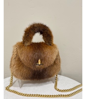 Tan fur handbag with gold...